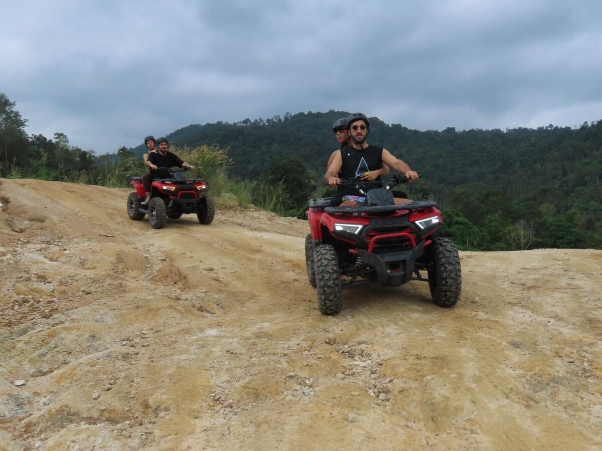 Off-road ATV riding on dirt trails in Koh Samui mountains